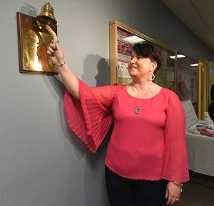 Walnut Plaque with Brass
                Bell - Ring for Cancer survivors: Ring this bell Three times well, Its toll to clearly say My treatments done,
                This course is run, And I am on my way
